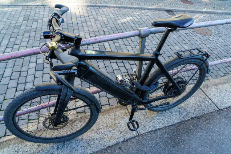 ebike locked to fence